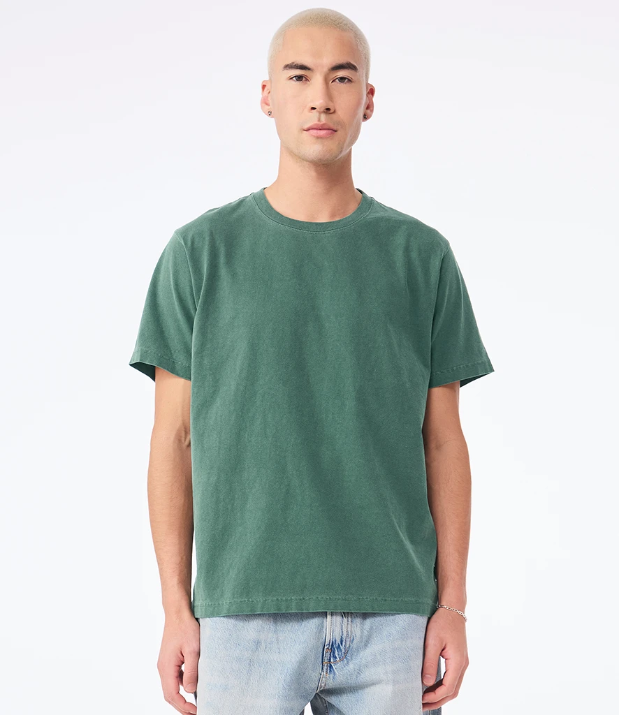 Man wearing washed effect heavyweight t-shirt in green Bella + Canvas