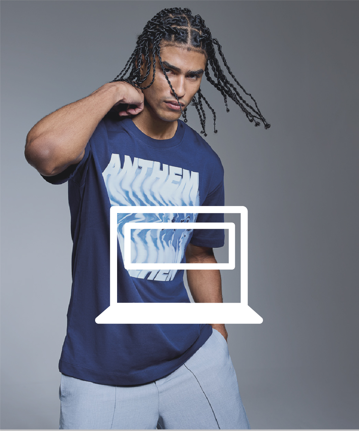 man in navy tshirt with white Anthem logo print