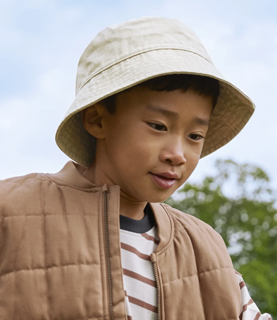 Young boy in natural Beechfield bucket hat in summer