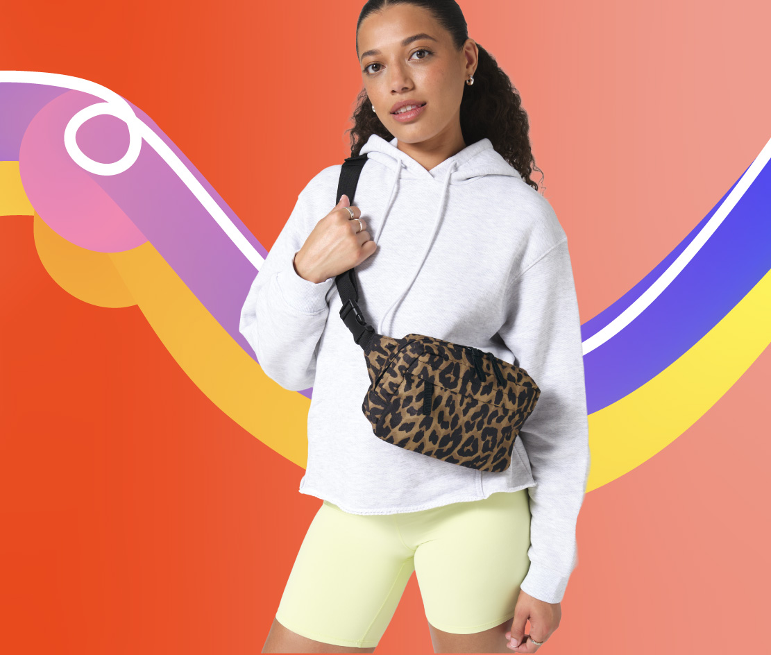Women wearing over the shoulder leopard print bag